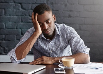 Man sleeping at desk